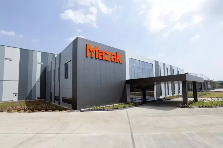 High-precision industrial roofing for Mazak India, Ranjangaon, Pune: Specialized Metecno PUF panel installation by Rishonn & Reyansh for world-class CNC manufacturing facilities.